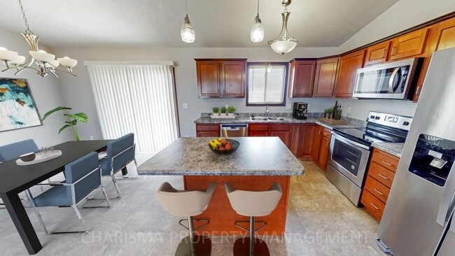 Building Photo - 3 BEDROOM, 2 BATH TOWN HOME, INDIVIDUAL ENTRANCE, DOUBLE ATTACHED GARAGE, PET FRIENDLY, NEWER DEV...