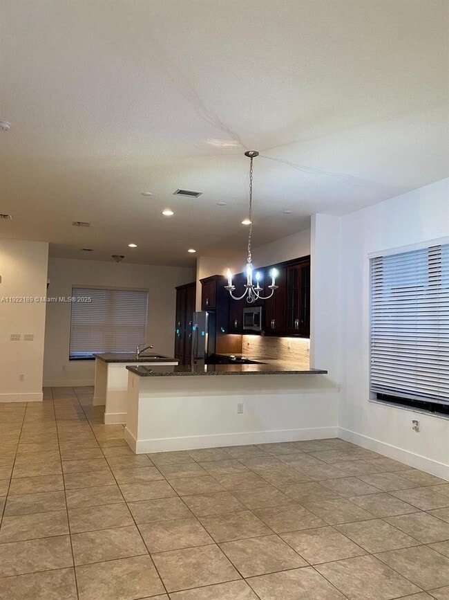 Building Photo - 9823 W 34th Ln