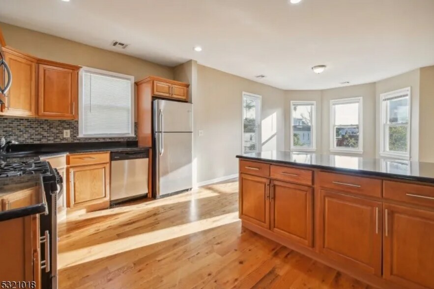 Kitchen Counter with Windows View - 53 Portland Pl