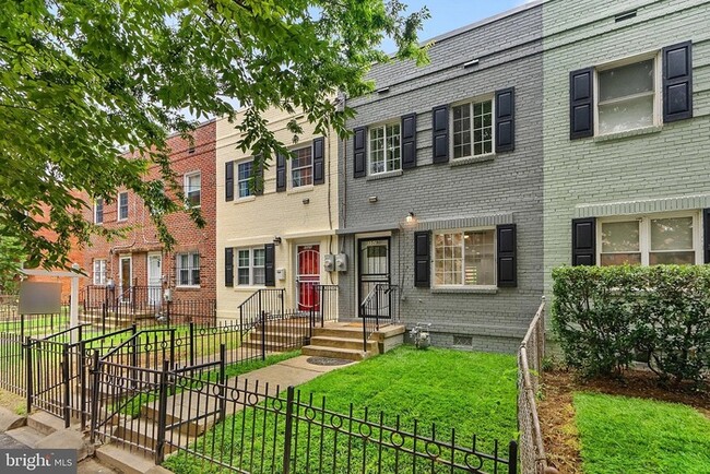 Primary Photo - Sun-filled townhouse in a prime location