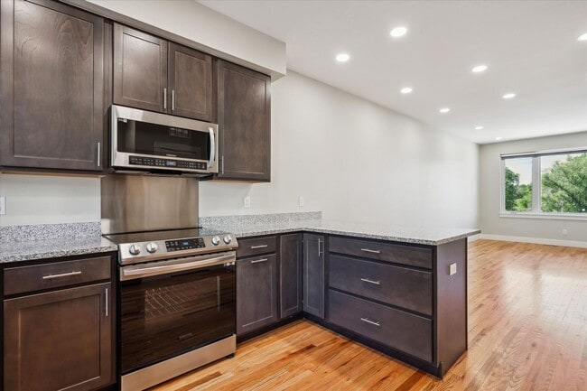 Building Photo - Modern 4-Bedroom Townhome with Rooftop Deck Near Sloan’s Lake & Light Rail