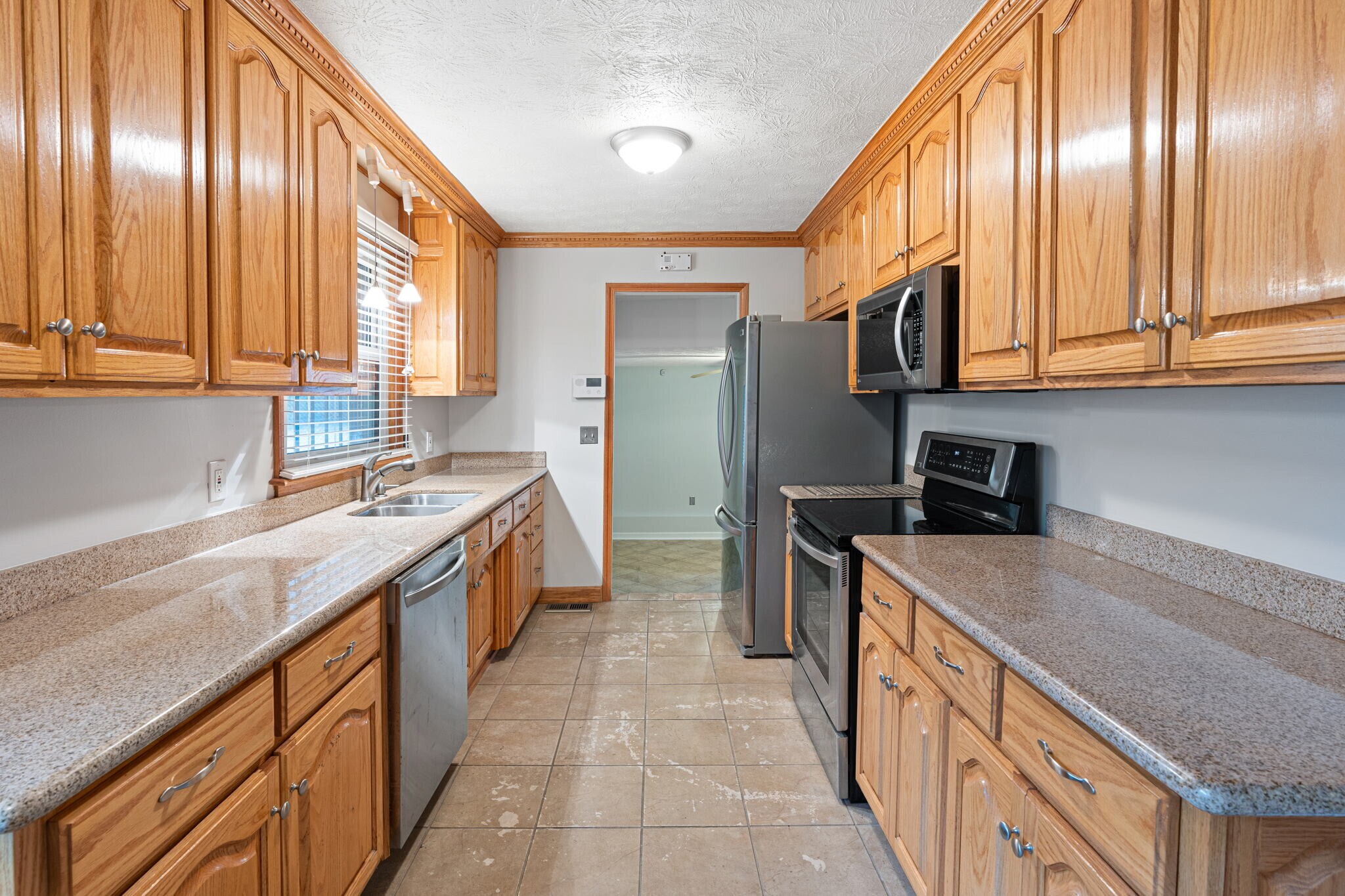 Kitchen that leads to office - 3841 Dubois Dr