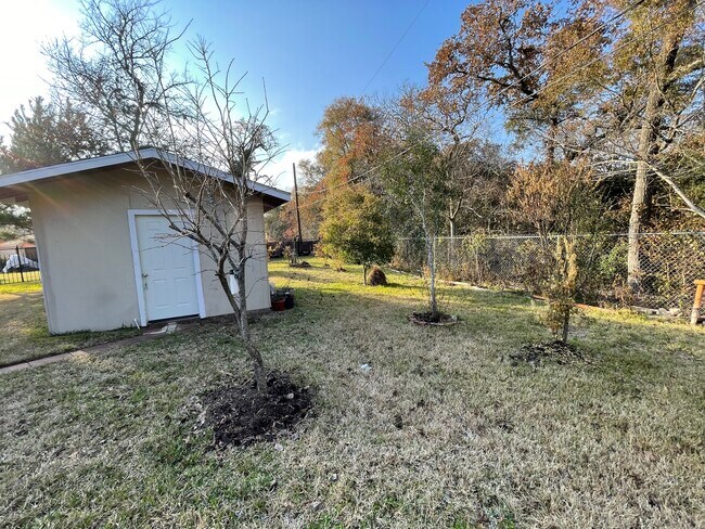 Backyard shed - 600 River Bend Dr