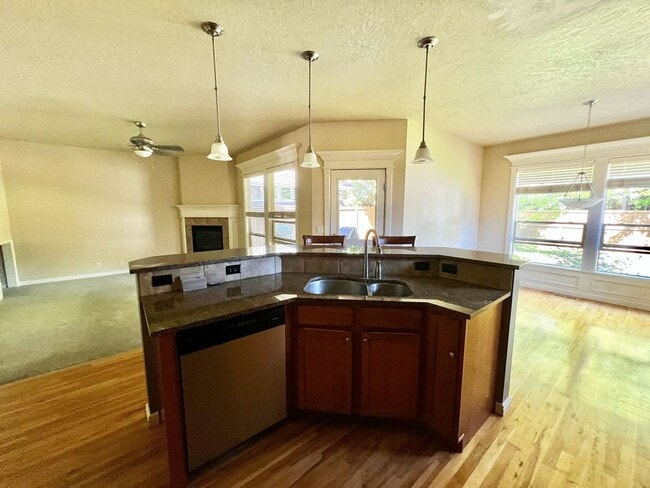 Building Photo - "Luxury Living: Stunning home with marble counter tops & Fireplace!"