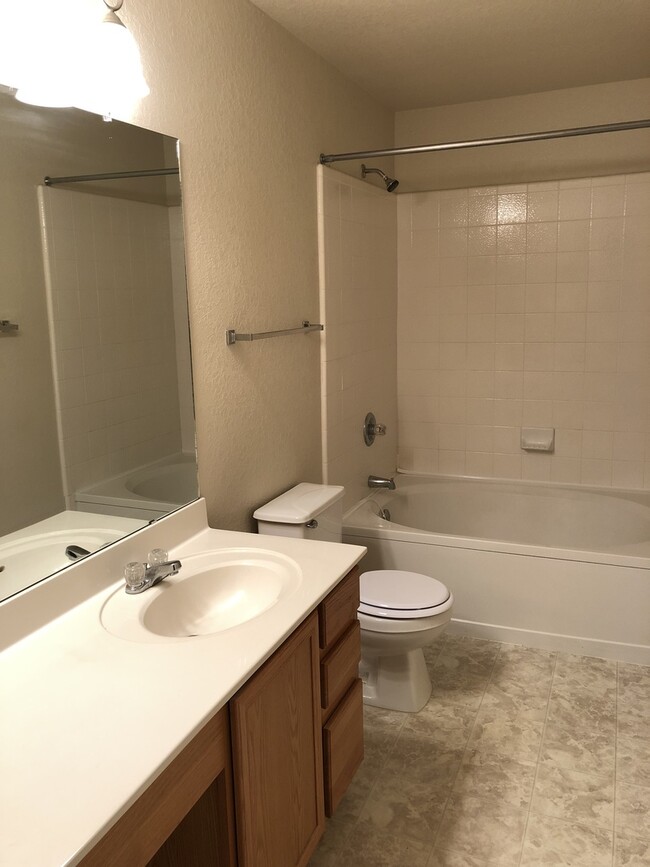 Building Photo - SPACIOUS 3 BEDROOM FEATURING 2 LIVING AREA...