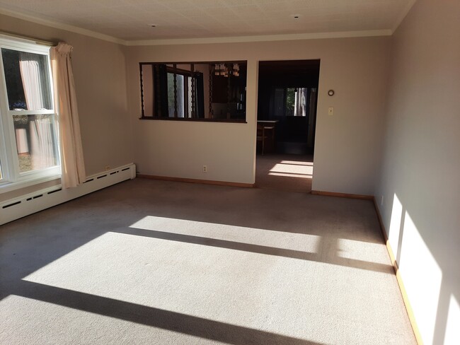 Living room with new energy efficient windows - 6979 US Highway 2 41 M35