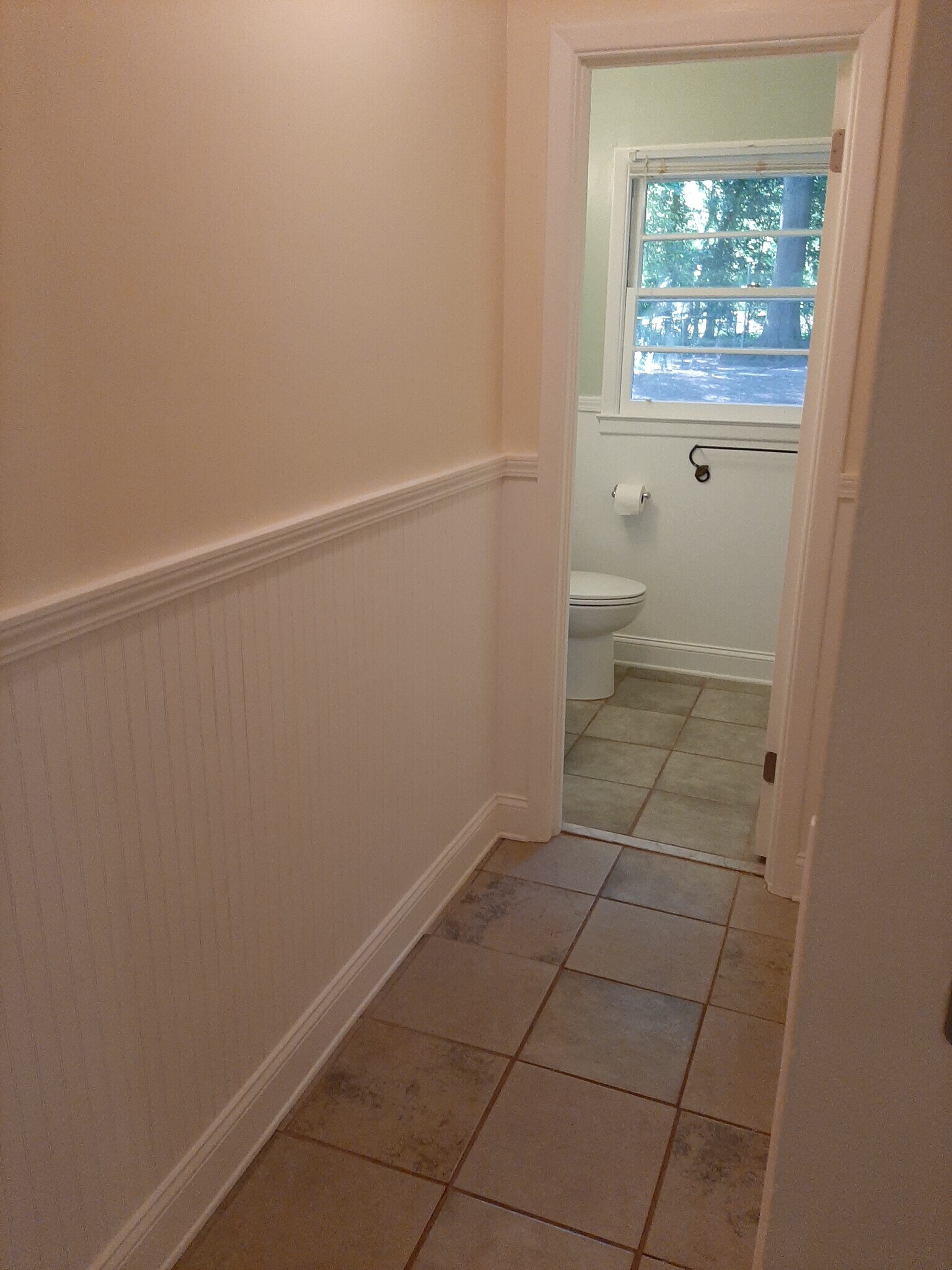 Off the main hallway to the right is the full bathroom and laundry area. - 2955 Fantasy Ln