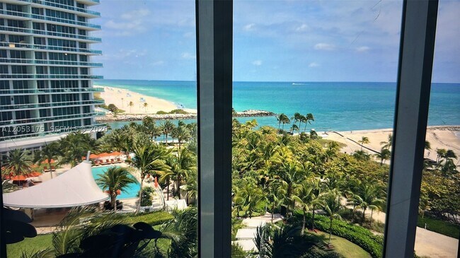 Building Photo - 10275 Collins Ave