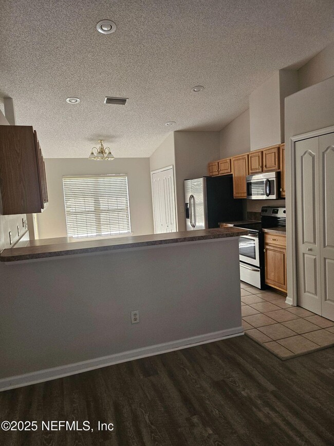 Building Photo - 9827 Nelson Forks Dr
