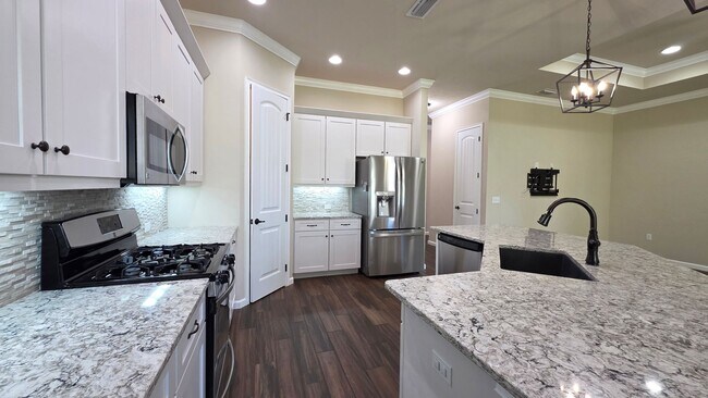 Building Photo - FOR RENT 4 BEDROOM 3 BATHROOM HOME