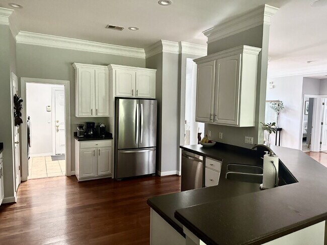 Building Photo - Beautiful 4-Bedroom Home in Desirable Baynard Park! | Hardwood Floors, Corian Countertops & Priva...