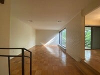 Building Photo - 2 Bedroom 1.5 Bathroom Apartment Unit Loca...