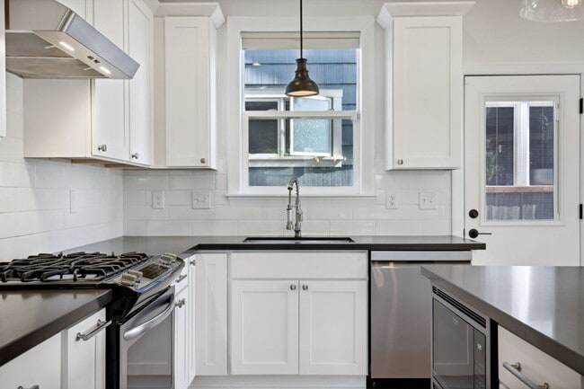 Building Photo - DESIRABLE CRESTON-KENILWORTH / CORNER LOT, LUXURY 4 BEDROOM, TWO EN-SUITES W/FULL BATHS