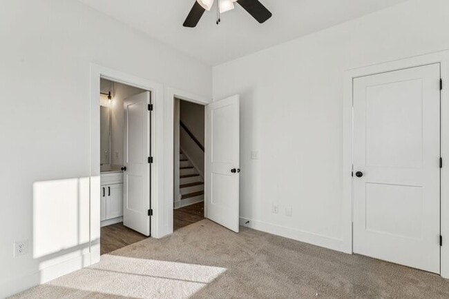 Building Photo - High-End 2BR Townhome | Rooftop Terrace + 2-Car Garage | 24-Unit Community