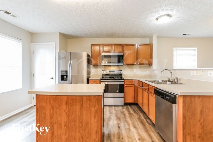 Building Photo - 7399 Kenrich Dr