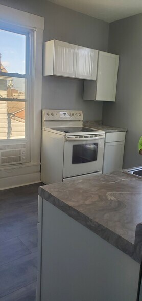 New Cabinets over stove - 131 S 7th St