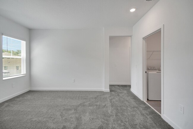 Building Photo - Stunning 4/3 in Gated Dora Parc! Water Views!