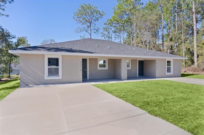 Building Photo - 9170 N Travis Dr