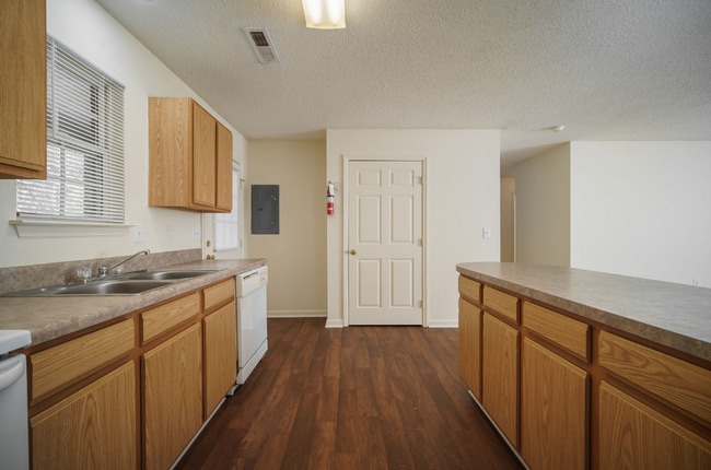 Building Photo - All Brick Building************Massive 2 Bedroom Villa************Single Level Villas