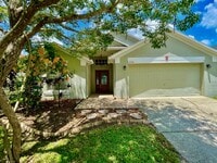 Building Photo - Modern 4-Bed, 2-Bath Solar-Powered Home Near UCF