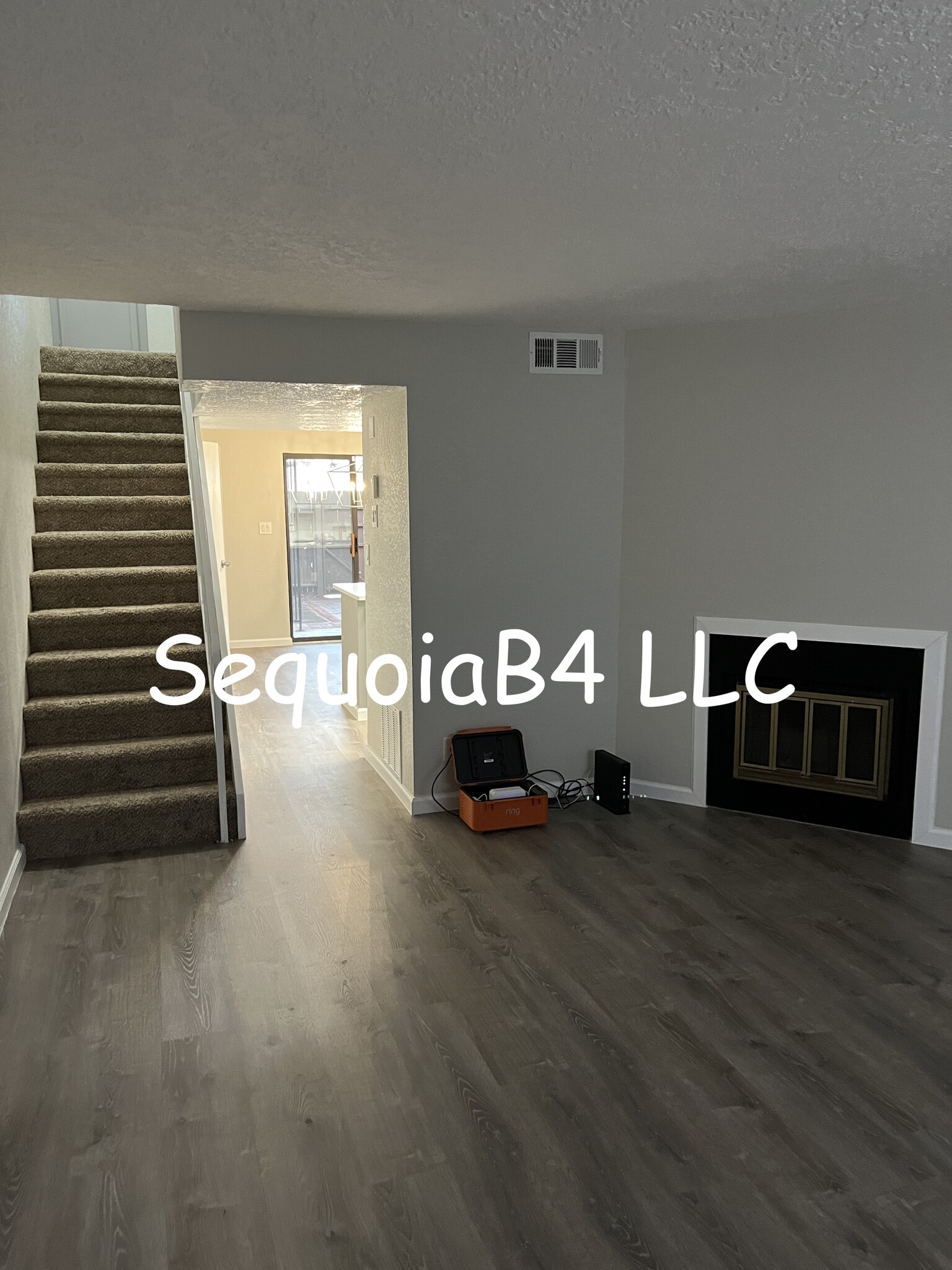 Living area facing toward stairway and kitchen - 6041 Sequoia Rd NW