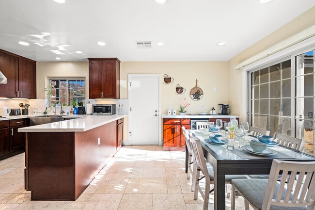 Building Photo - Luxury Estate with Sparkling Pool & Elegant Amenities