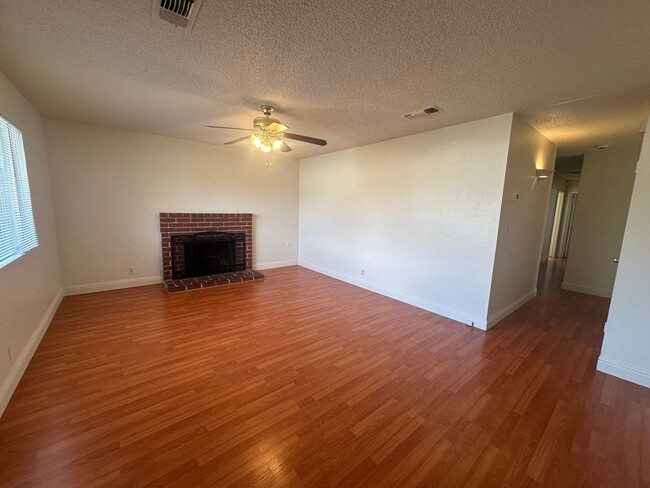 Building Photo - Recently Updated 4 Bedroom Home with Yard