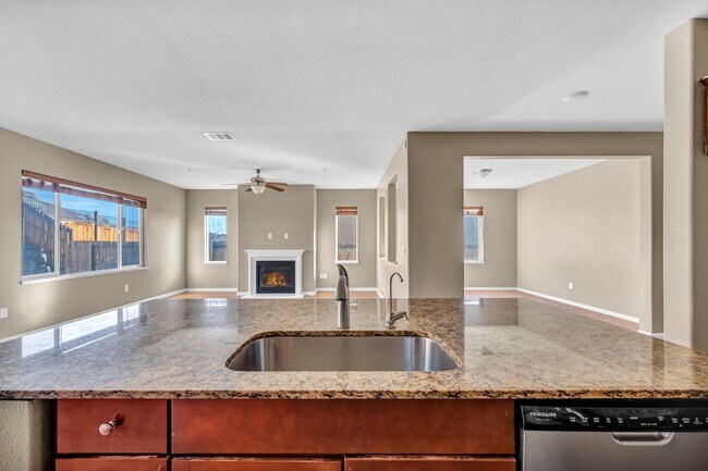 Building Photo - Sun-Filled, Spacious Living with a Three-Car Garage