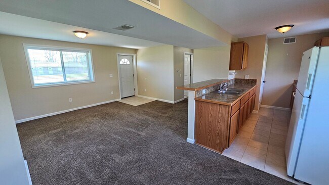 Building Photo - UPDATED 2 BEDROOM DUPLEX HOMES FOR LEASE!