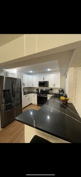 Building Photo - 8489 Boca Glades Blvd W