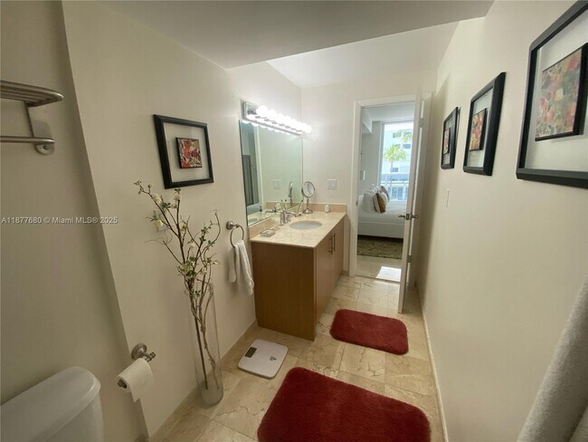 Building Photo - 10275 Collins Ave