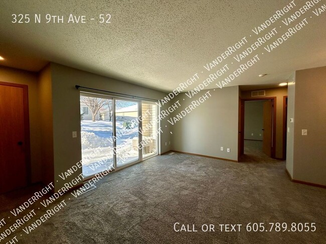 Building Photo - Walk Out 2 Bedroom With Private Patio!