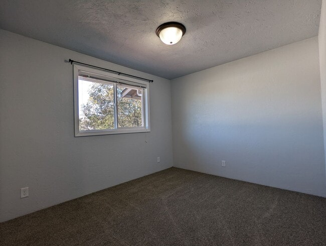 Building Photo - Newly Renovated 2-Bedroom, 1.5-Bath Apartment with Private Patio and On Site Laundry!