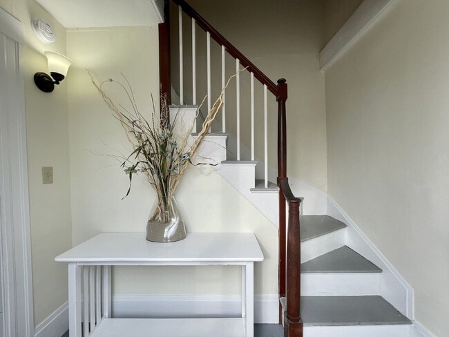 Building Photo - Seeking a roommate for a 2 bdr, 2 bath lower level condo with a porch and private yard, 1.5 miles...