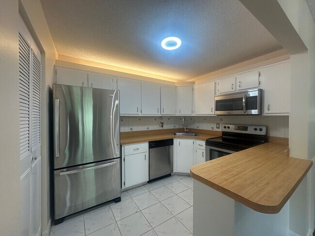 Building Photo - 5801 Whispering Pine Way