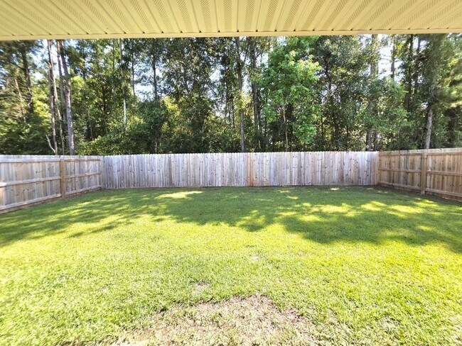 Building Photo - Spacious 4BR Home Near Navy Federal & UWF ...