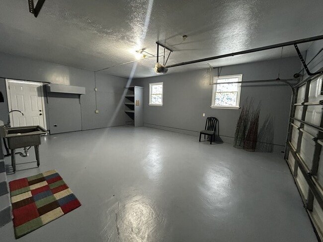 Building Photo - 3Br brick house with garage and finished b...