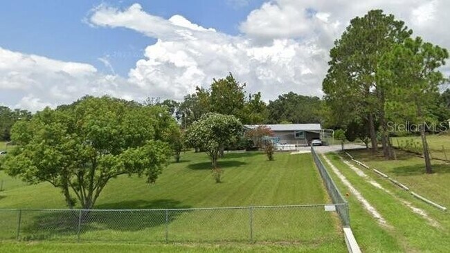 Building Photo - 825 Orchid Grove Blvd