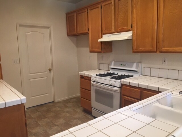 Building Photo - Three bedroom in gated community.