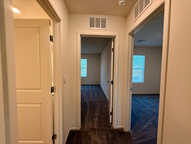 Building Photo - Brand-New Townhome for Rent in the Highly ...