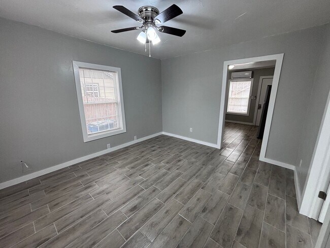 Building Photo - Remodeled 2 bedroom, 1 bathroom house with fenced yard and garage