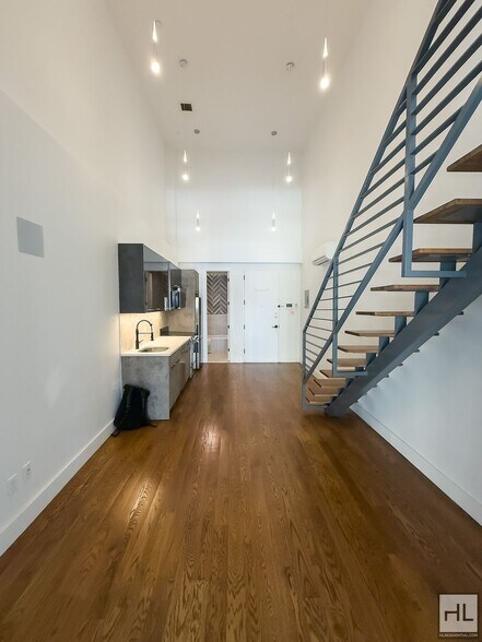 Building Photo - Stunning Two-Bedroom Duplex with Soaring 1...