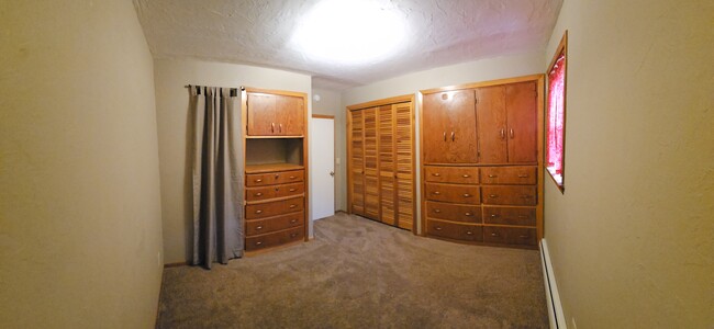 Bedroom with built-ins - 205 2nd St W