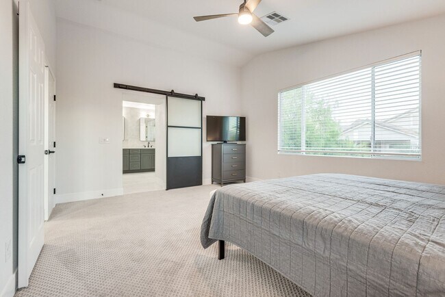 Building Photo - FULLY FURNISHED! Exudes sophistication wit...
