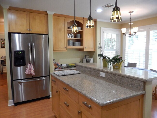 Building Photo - GORGEOUS NE 4/2.5 on 1 Acre w/ Fenced Yard, Garage, Washer/Dryer, Spa Tub, Stainless Appliances, ...