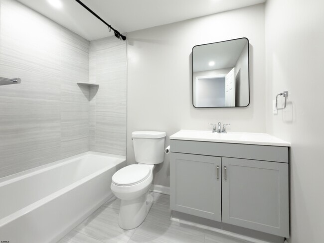 Building Photo - 203 E Plaza Pl