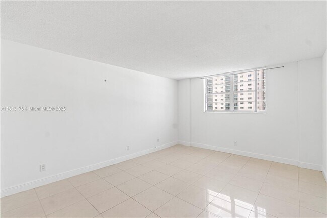 Building Photo - 19390 Collins Ave