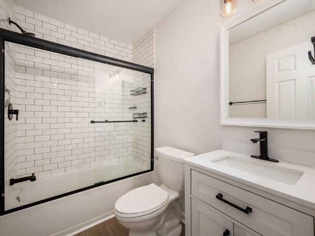 Building Photo - Half Month FREE — Updated 2BR w/ In-Unit Laundry, Central A/C + 2 Parking Spots | Touring starts ...