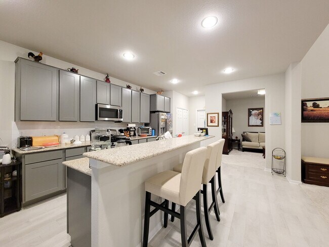 Building Photo - This stunning 2-year-old house with 4 beds, 3 baths, and an attached 2-car garage, it offers ampl...