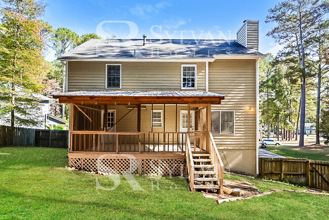 Building Photo - Welcome to this charming abode.